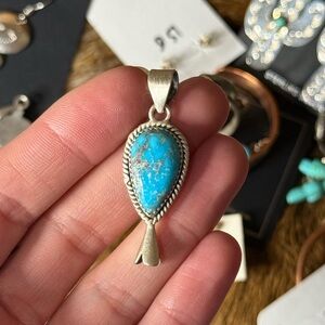 White water Turquoise and sterling silver Pendant with blossom